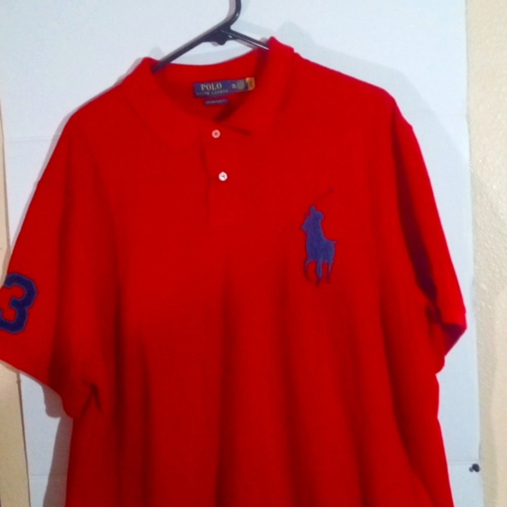 Red collar Polo by Ralph Lauren the size is double XL the color is red